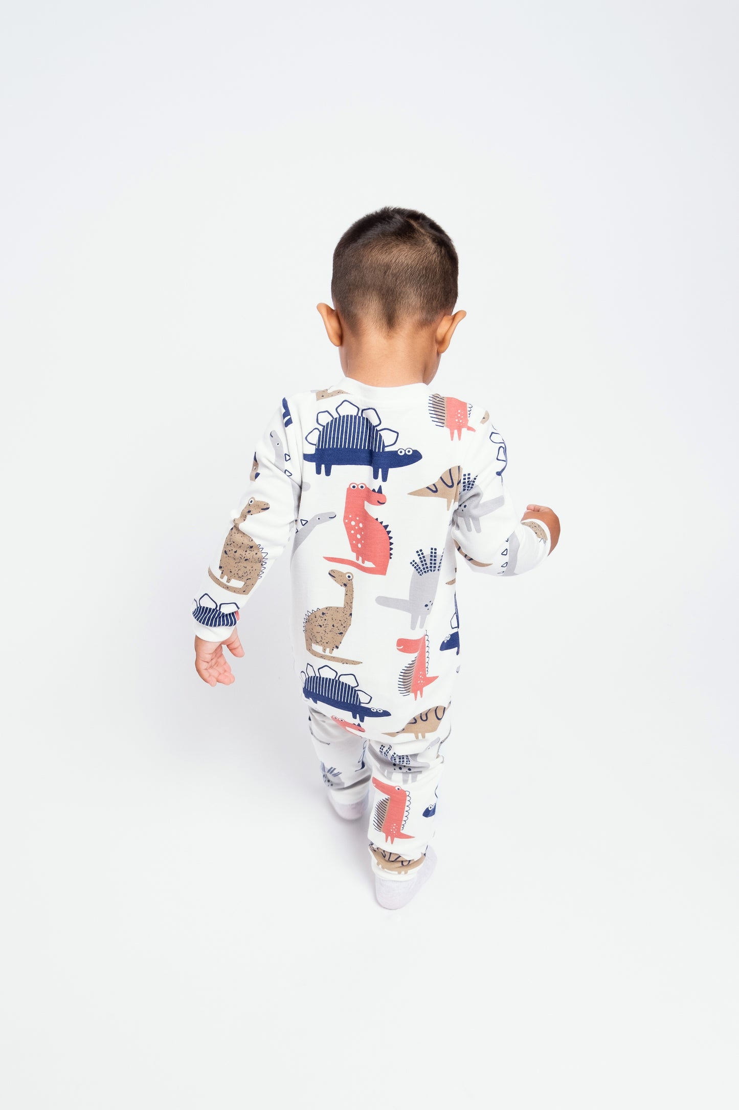 On-the-Go Zipper Jumpsuit with Non-Slip Footies in (Dino Party) Pattern - White